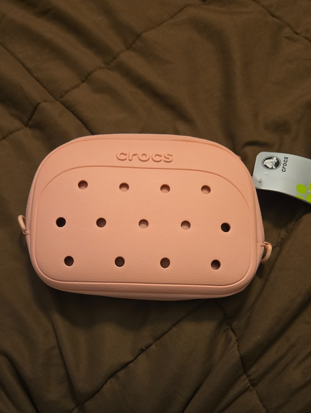 CROCS Blush Pink Croslite Vent Hole Crossbody Bag. Color POWDER PINK